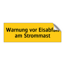 Warnung vor Eisabfall am Strommast