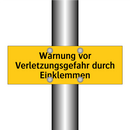 Warnung vor Verletzungsgefahr durch Einklemmen