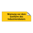 Warnung vor dem Greifarm des Industrieroboters