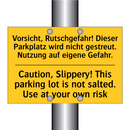 Vorsicht, Rutschgefahr! Dieser /.../ - Caution, Slippery! This parking /.../