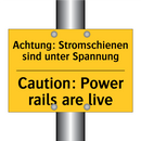 Achtung: Stromschienen sind unter /.../ - Caution: Power rails are live