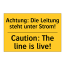 Achtung: Die Leitung steht unter /.../ - Caution: The line is live!