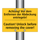 Achtung! Vor dem Entfernen der /.../ - Caution! Unlock before removing /.../