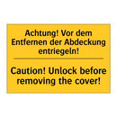 Achtung! Vor dem Entfernen der /.../ - Caution! Unlock before removing /.../