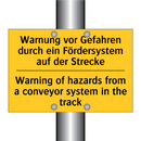 Warnung vor Gefahren durch ein /.../ - Warning of hazards from a conveyor /.../