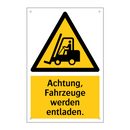 Achtung, Fahrzeuge werden entladen.