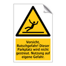 Vorsicht, Rutschgefahr! Dieser Parkplatz wird nicht gestreut. Nutzung auf eigene Gefahr.