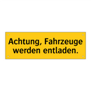 Achtung, Fahrzeuge werden entladen.
