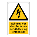 Achtung! Vor dem Entfernen der Abdeckung entriegeln!