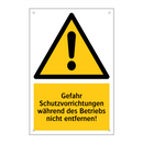 Gefahr Schutzvorrichtungen während des Betriebs nicht entfernen!