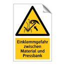 Einklemmgefahr zwischen Material und Pressbank