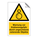 Warnung vor Einklemmgefahr durch ungeschützte rotierende Objekte