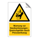 Warnung vor Handverletzungen - Quetschgefahr durch Presswerkzeug