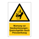 Warnung vor Handverletzungen - Quetschgefahr durch Presswerkzeug