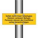 Gefahr durch Kran! Unbefugtes Klettern verboten! Befugte Personen müssen den Kranführer vorher benachrichtigen.